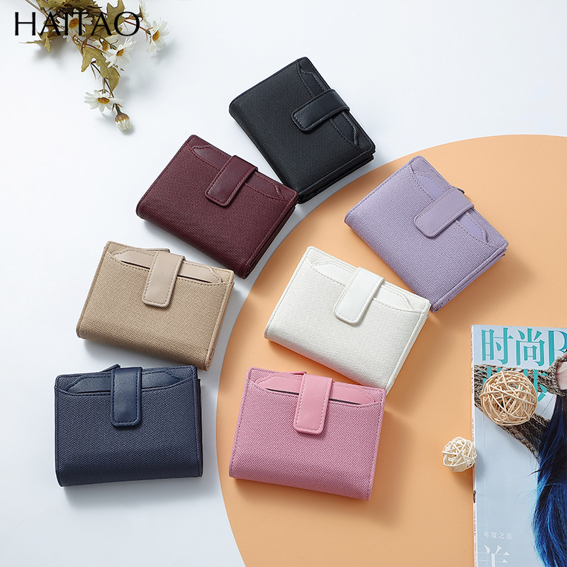 Nueva billetera para mujer, bolso de tarjeta de sentido premium para mujer, corto, 20% de descuento, color sólido, cremallera, monedero transfronterizo de poliéster, personalización