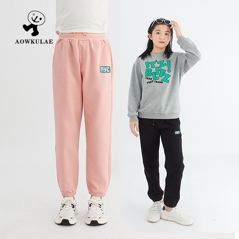 Pantalones de invierno para niños estilo coreano nuevos Pantalones deportivos engrosados para niños medianos y grandes pantalones de niñas calientes forrados de lana al por mayor