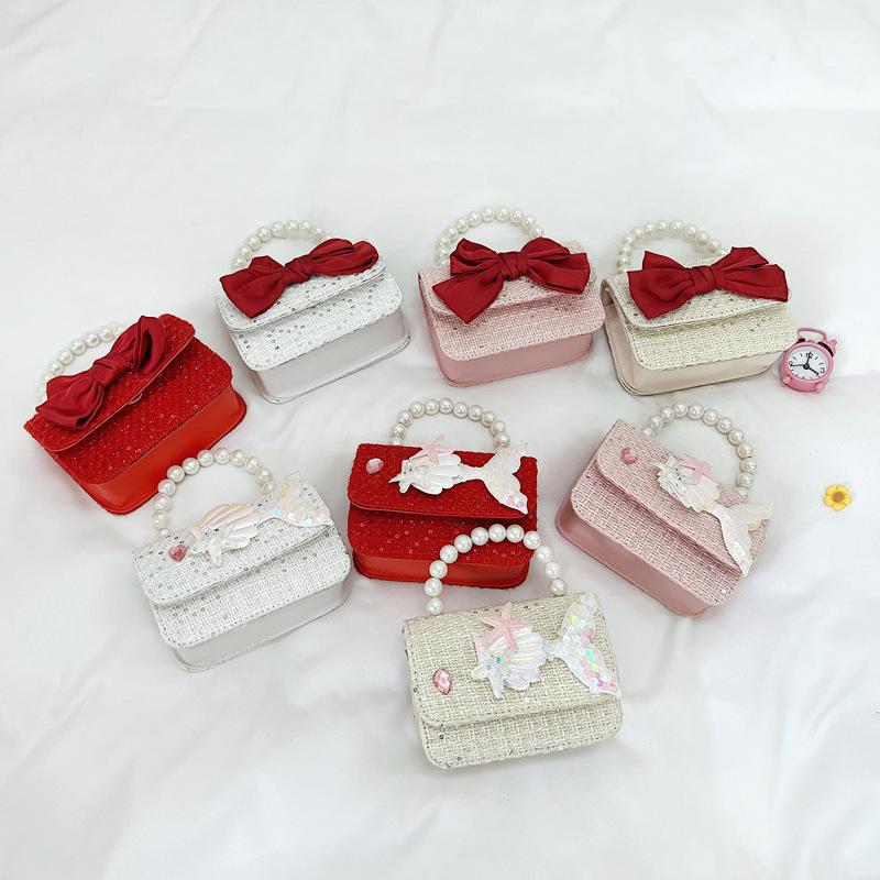 Bolsos infantiles, bolsos de arco, bolsos de moda, bolsos de princesa, bolsos de hombro para niñas, bolsos de cambio para reducir la carga