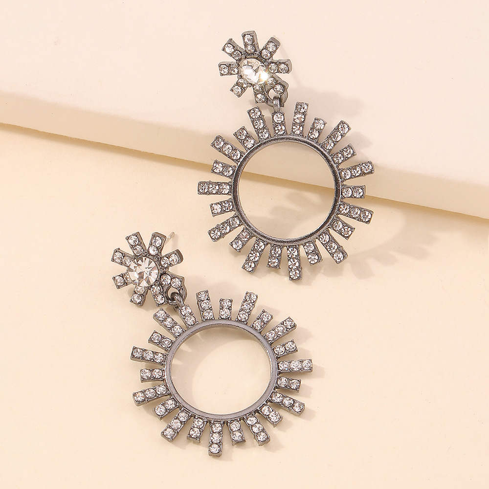 Fashion Geometric Hollow Round Rhinestone Sunflower Alloy Earrings Wholesale display picture 5