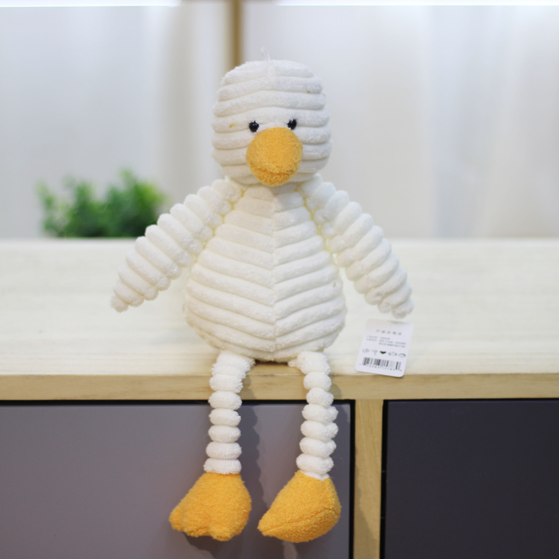 Fuente de la fábrica a rayas animal felpa muñeca de juguete creativo animal muñeca grab máquina muñeca al por mayor accesorios de ropa