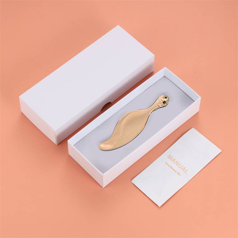 Nuevo masajeador facial en stock, mini raspador tipo hoja de aleación de zinc, herramienta metálica para masaje facial