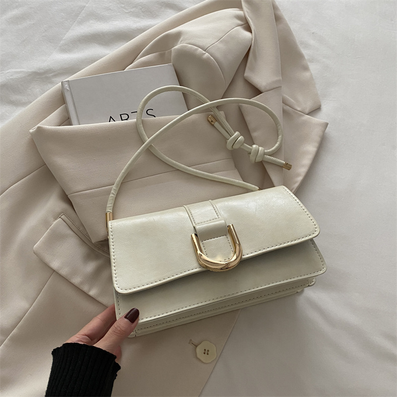 Diseño francés de nicho retro bolso debajo de la axila para mujeres 2024 otoño y invierno nuevo paquete de mano de hombro de alta calidad