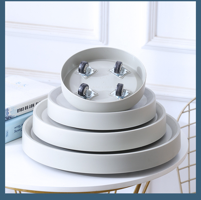 プラスチックの移動可能な植木鉢のトレーのローラーは卸売りします。