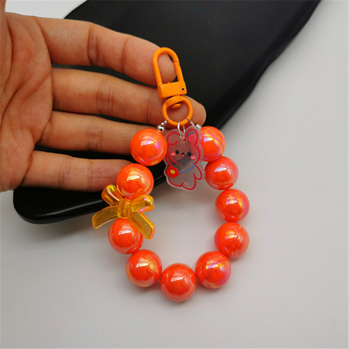 Electroplated beaded bow car keychain mobile phone pendant cute candy color paint circle pearl accessories bag decoration