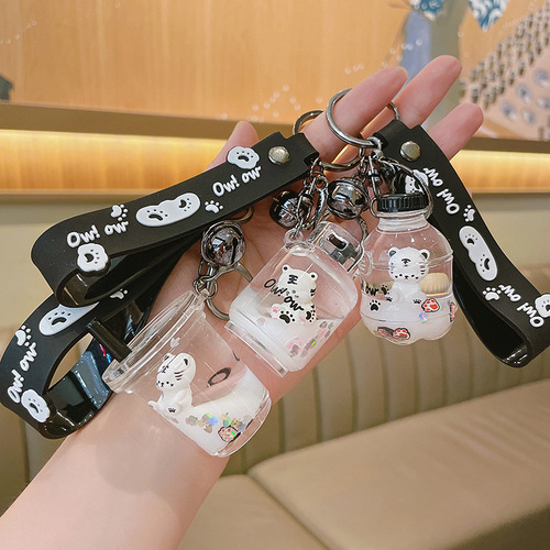 Creative floating doll oiled tiger key chain acrylic quicksand bottle key chain exquisite car pendant wholesale