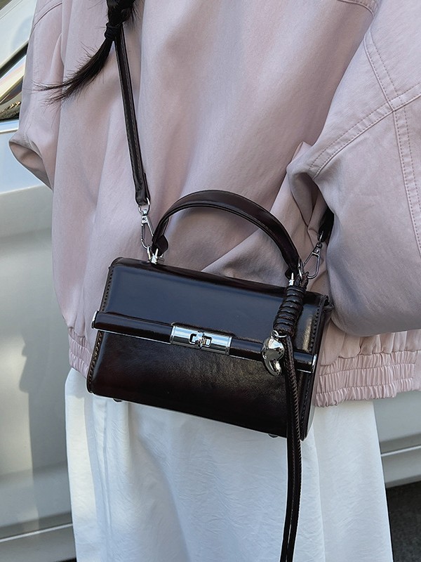 Bolso de mano de alta sensación para mujeres 2026 nuevo bolso cuadrado ligero de textura de lujo estilo coreano nicho bolso de hombro de mujer