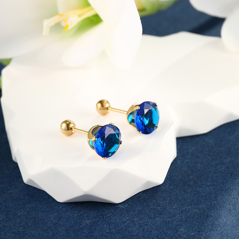 Joyería de Xuping de acero inoxidable tornillo torcedura hebilla de cuatro garra pendientes de la personalidad de la moda japonesa y coreana pendientes de Gema artificial azul