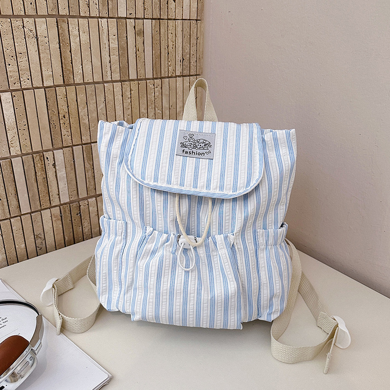 Coreano de alto valor, mochila a rayas, mochila de viajes ocio, mochila al aire libre, mochila fresca.