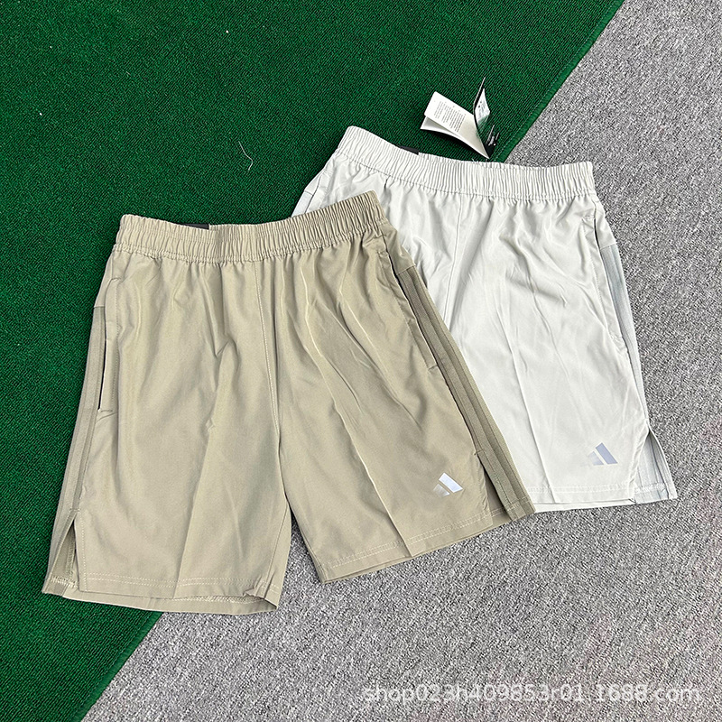 Pantalones cortos de secado rápido para hombres ligeros y transpirables, pantalones casuales de cinco puntos para hombres, deportivos de tejido resistentes al desgaste para hombres, verano nuevo