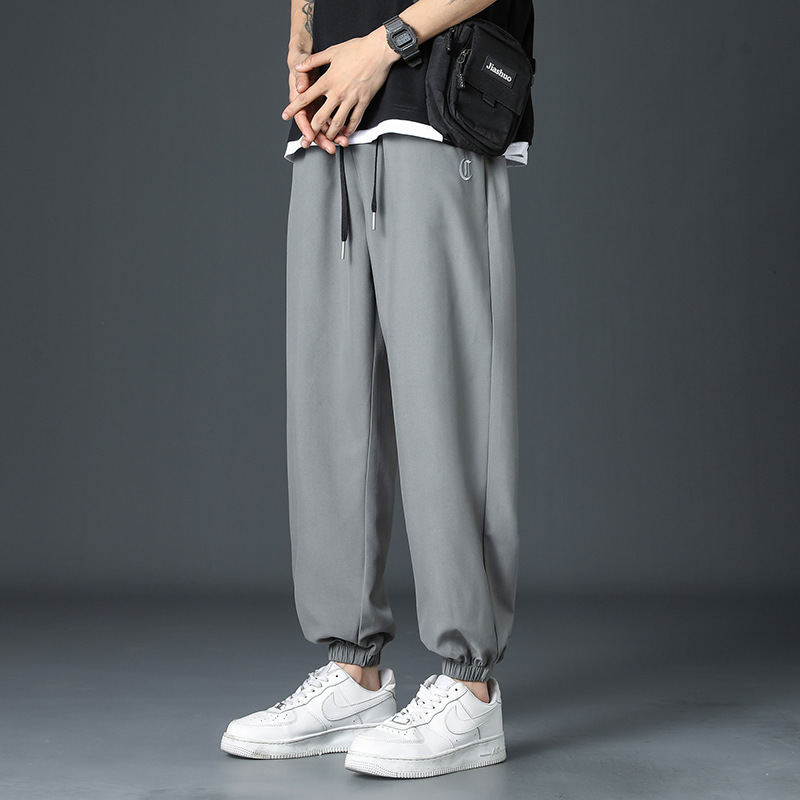 Hombres primavera y verano 2023 nuevos pantalones sueltos, pantalones casuales deportivos americanos de nueve puntos