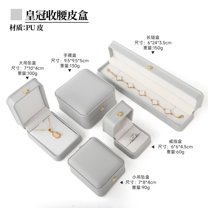 Gris; caja de anillo de corona