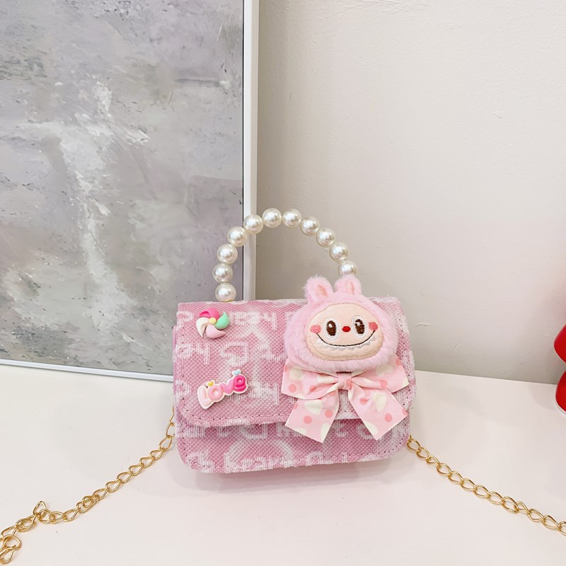 Bagos para niños 2025 nuevo estilo coreano de niña princesa bolso de cambio de mano lindo bolso de hombro de dibujos animados de peluche