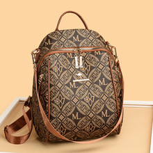 跨境复古印花菱格双肩女包包便宜卖质感pvc大字母出游背包女书包