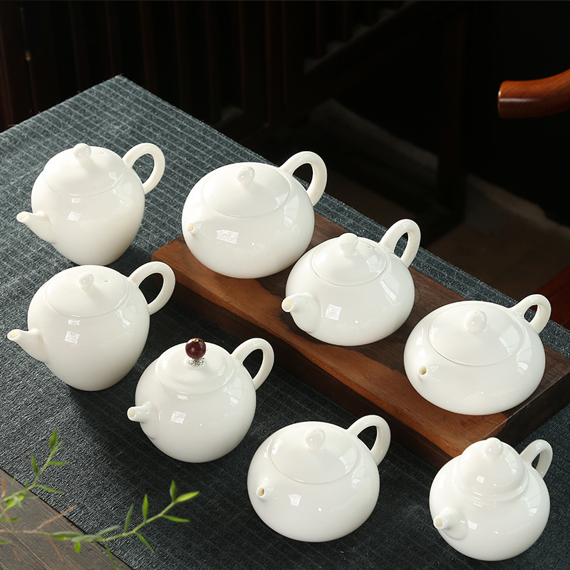 Dehua mutton fat jade white porcelain teapot ceramic home kung fu tea set teapot handmade simple size single pot wholesale Dehua mutton fat jade white porcelain teapot ceramic home kung fu tea set teapot handmade simple size single pot wholesale