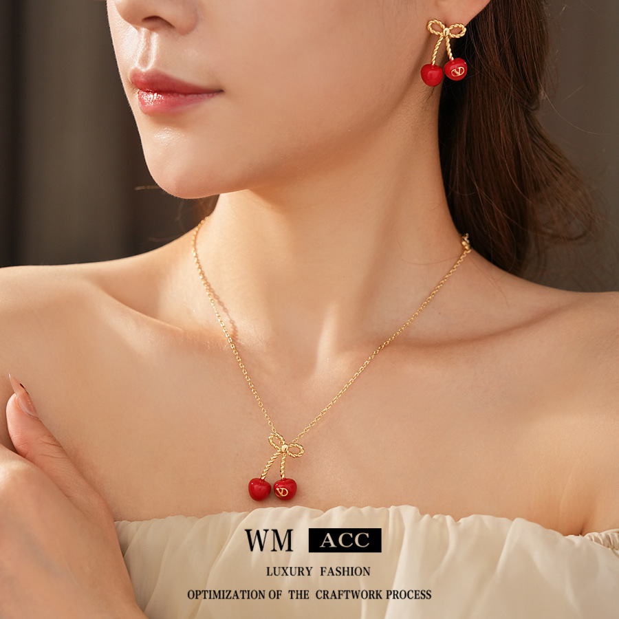 Aguja de plata, arco, letras de cereza, pendientes, collares frescos y dulces, cadenas de clavícula, temperamento de nicho, joyería femenina, sentido superior.