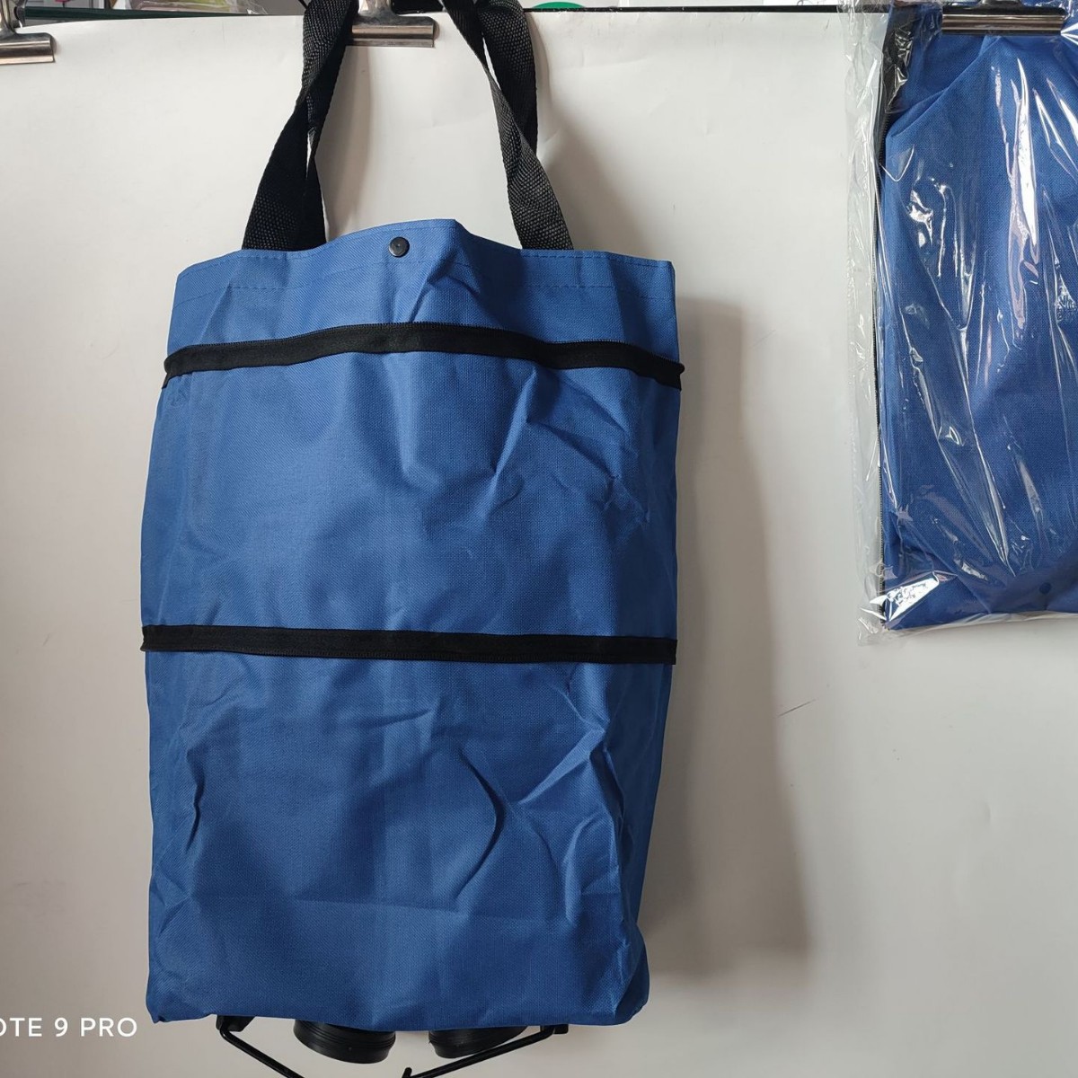 Venta al por mayor bolsa de compras plegable de poliéster carrito de compras portátil supermercado remolcador bolsa rueda bolsa supermercado bolsa