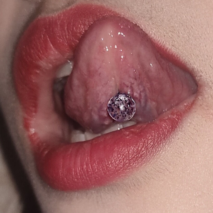 Silver pointed spike labret stud material detail