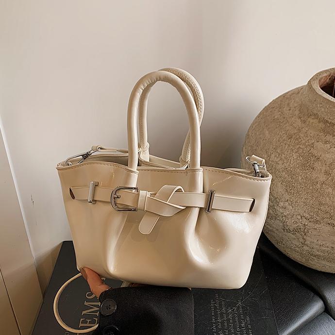 Bolsa de cubo de moda coreana 2025, nueva bolsa de hombro de moda nicho, alta sensación, bolsa de hombro de mujer.