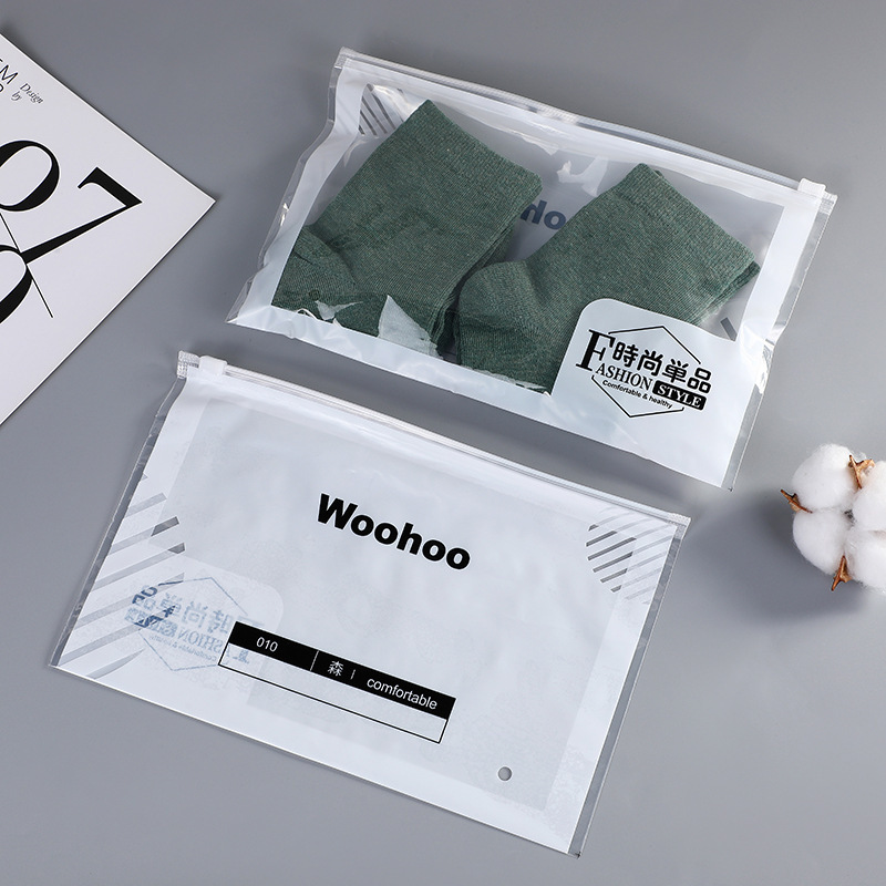 Bolsa con cremallera de ropa Bolsa con cremallera de crisantemo pequeño Bolsa de embalaje de camiseta Bolsa de ropa interior Bolsa de ropa PE esmerilada pequeña bolsa ziplock