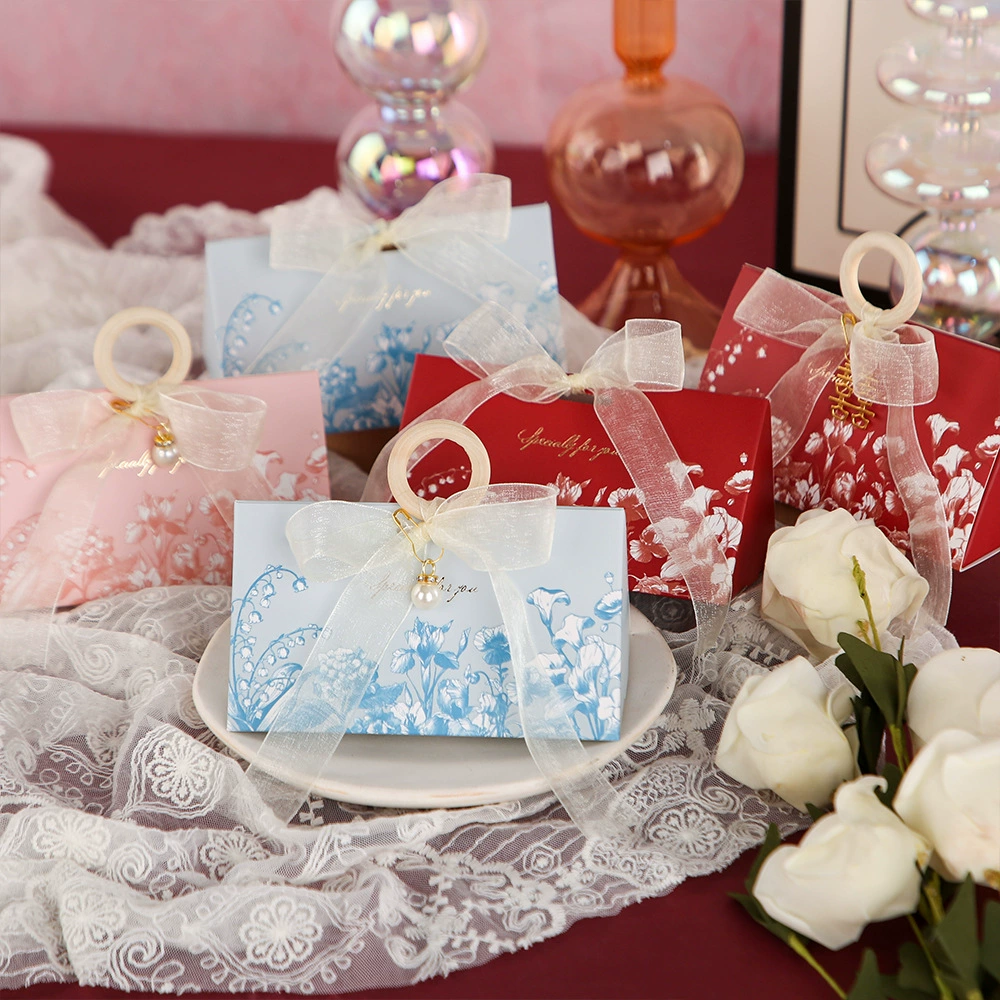 2024 новая коробка конфет премиум-класса чувство свадебная ручная сумка конфеты бизнес праздничная подарочная коробка бумажная коробка с ручкой подарочная коробка