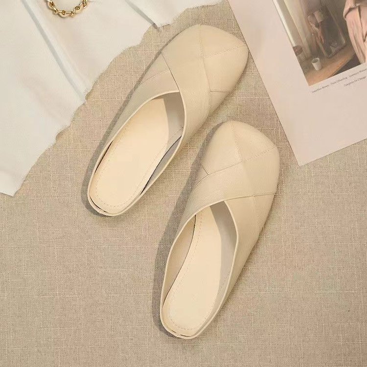 Baotou zapatillas para mujeres 2026 primavera y verano nueva moda exterior de cuero suave zapatos perezosos con suela suave zapatos de cabeza grande zapatillas frías francesas