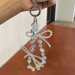携帯電話のチェーンの新型の軽くて豪華な高級の女性の水晶のひもの数珠の手首のビーズのペンダントの蝶結びの携帯電話のチェーン