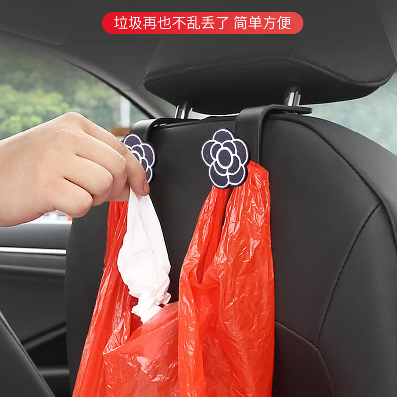 Meiyesi suministros de decoración de automóviles silla trasera gancho de coche celebridad de Internet hermoso gancho de dibujos animados almacenamiento de camelia