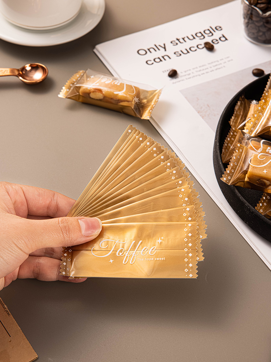 Nueva bolsa de embalaje transparente simple de caramelo de toffee nougat bolsas de sello de máquina de azúcar de café bolsas de sello de nieve crisp bolsas de sello independientes