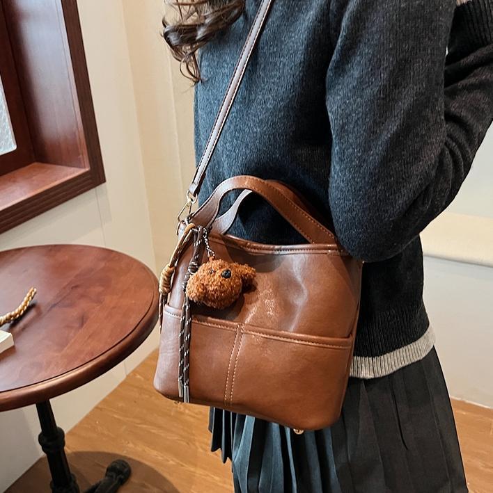 Bolso de moda simple de mujer 2024 nuevo ocio versátil bolso de cubo transfronterizo de color sólido bolso de hombro