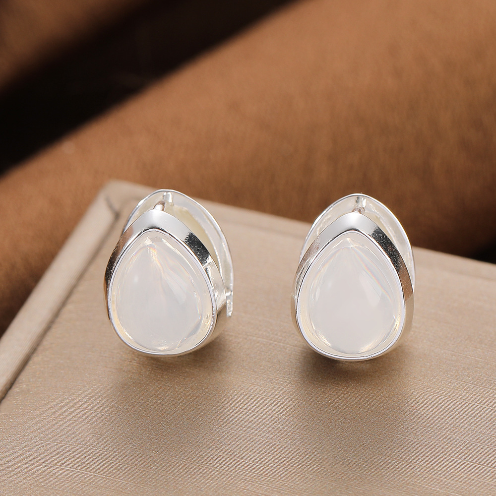 Pendientes de ópalo de diamantes con aguja de plata Pendientes de lujo ligero de todo fósforo de moda de alta gama Pendientes de circón simples y exquisitos al por mayor