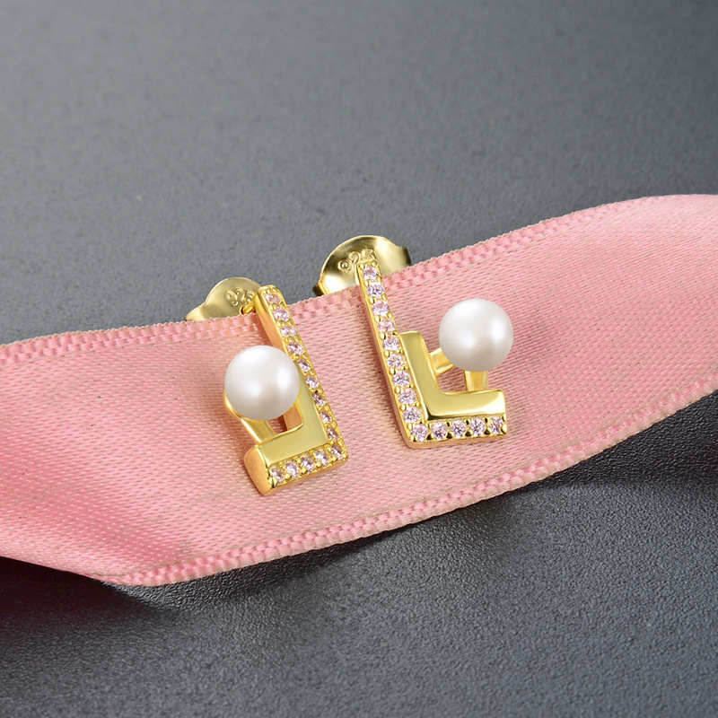 Venta caliente transfronteriza s925 plata diamante Stud pendientes moda creativa estilo Chanel luz lujo elegante pendientes para las mujeres al por mayor