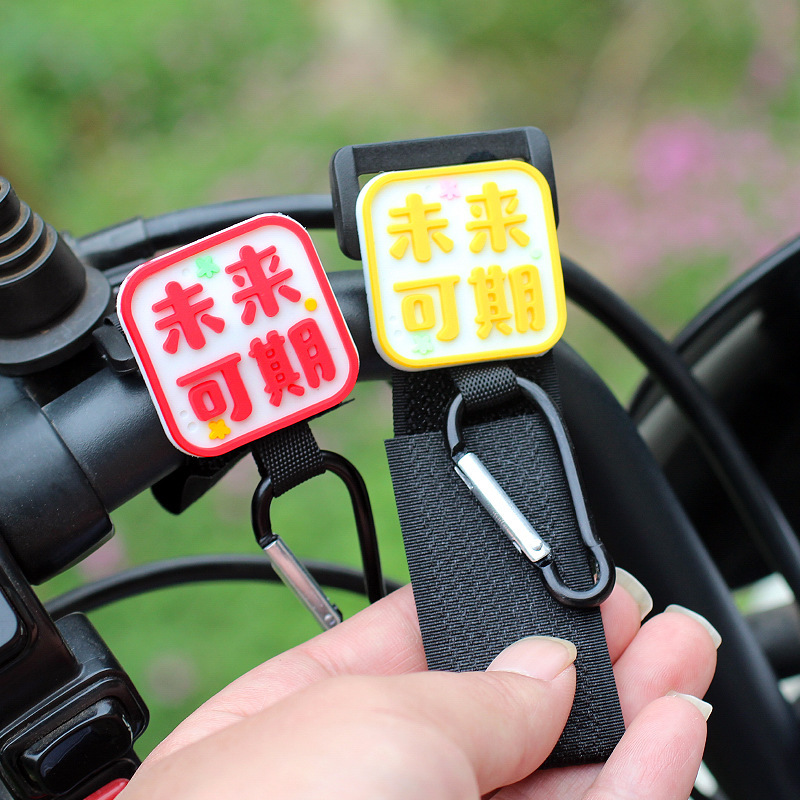 Cerradura de gancho de coche eléctrico frontal universal sin perforación lindo de dibujos animados multifunción bicicleta bolsa colgante de objeto pesado