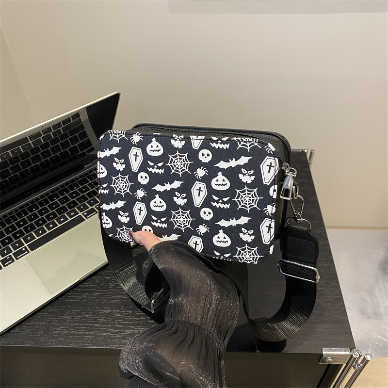 Bolso de mujer transfronterizo 2025 nuevo bolso de mujer impresión calavera cámara bolso pequeño bolso de hombro de aire extranjero bolso de mochila de teléfono móvil