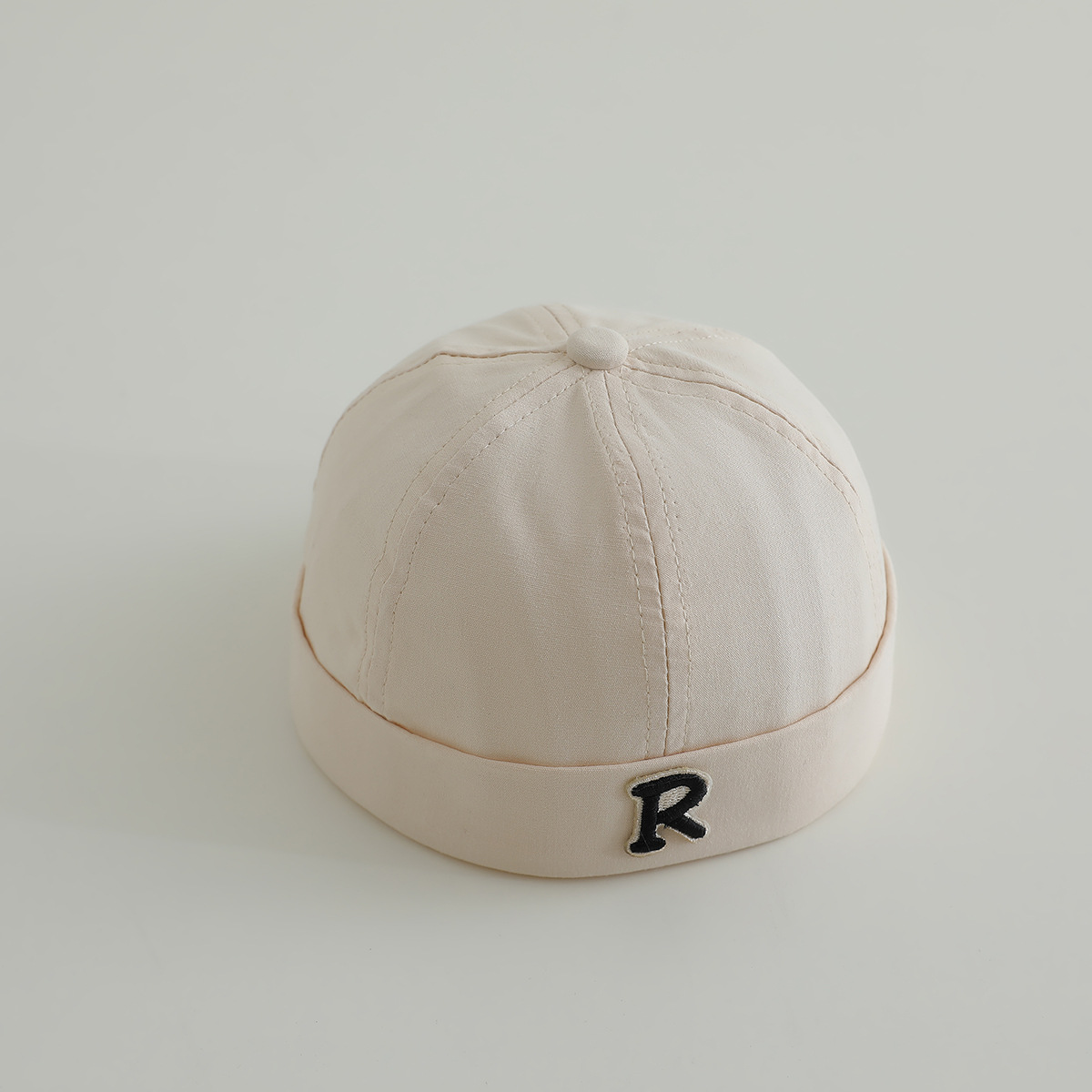 Primavera niños terratenientes sombreros hombres y mujeres letras de la marea sin bordes sombreros de piel de melón sombreros de calabaza sombreros de boina de personalidad