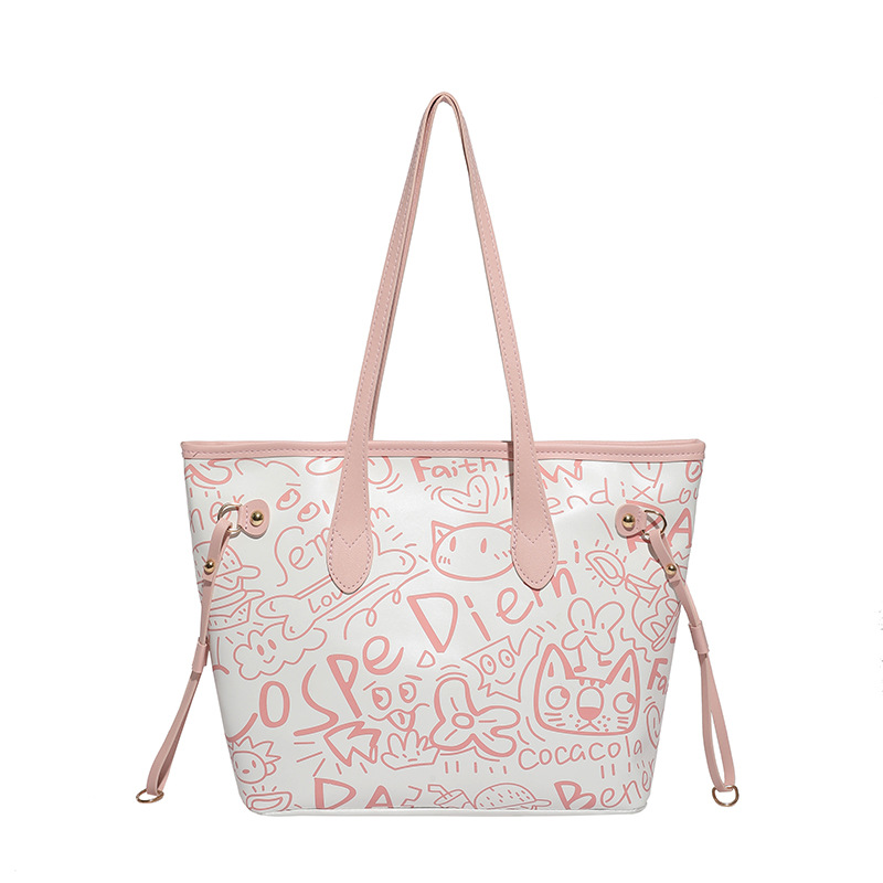 Nicho de diseño de graffiti bolso para mujeres 2025, nuevo bolso de hombro de mano casual, bolso de brazo de viaje de gran capacidad