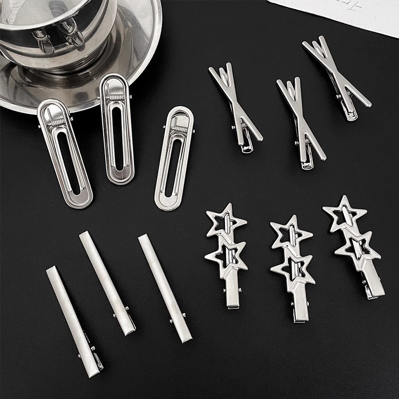Fijación de cabello de metal fría plata en forma de clip de nariz de pato temperamento agujero estrellas clip de cabello frente lateral clip de cabello roto mujer