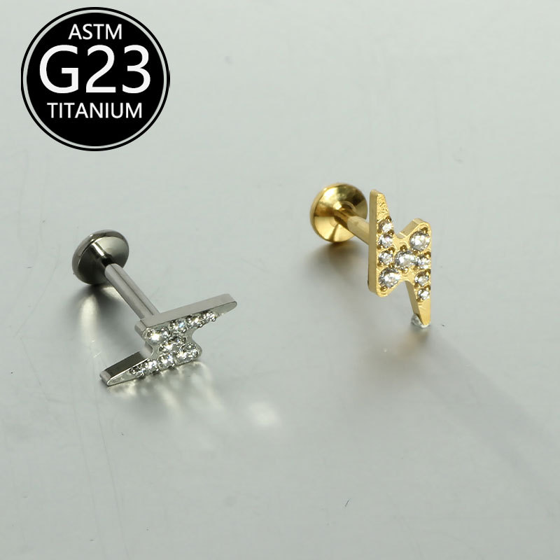 Silver pointed spike labret stud material detail