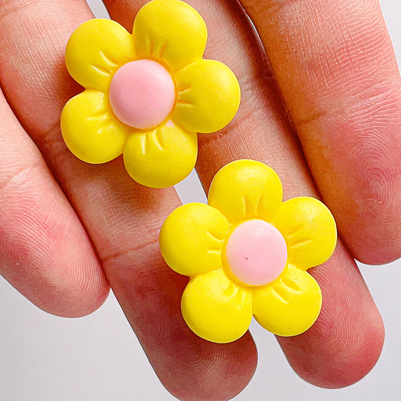 Nuevas series de flores de siete colores DIY accesorios de resina crema agujero de goma agujero de botón de zapato flores transparentes botón de zapato desmontable