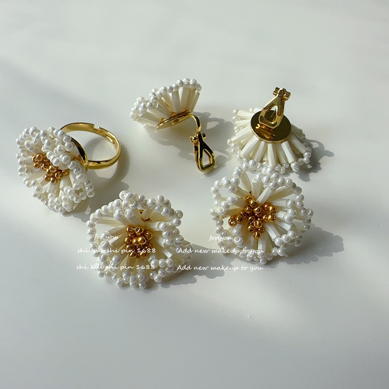 Pastoral style Mori small fresh rice beads flower earrings lively age-reducing seaside holiday Joker earrings jewelry wholesale