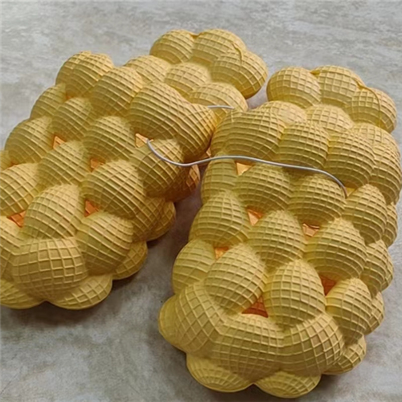 Sandalias de verano al por mayor desgaste de las mujeres al aire libre hogar grueso inferior pareja interior antideslizante EVA casa antideslizante zapatillas de burbuja