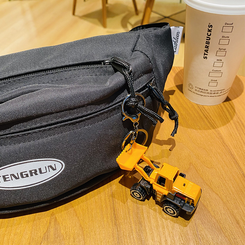 Creativo de dibujos animados aleación ingeniería vehículo excavadora llavero exquisito lindo bolsa colgante par pequeño regalo al por mayor