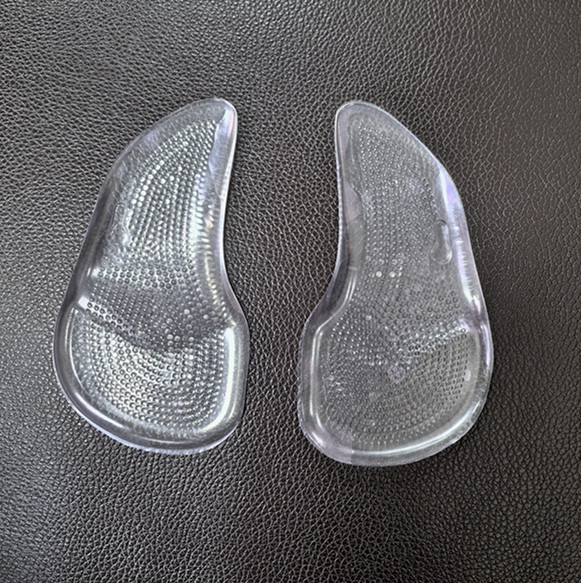 Almohadilla para arco de hombres y mujeres masaje de corrección de pie plano almohadilla de pie de silicona suave soporte de arco pie almohadilla de soporte de arco cardíaco