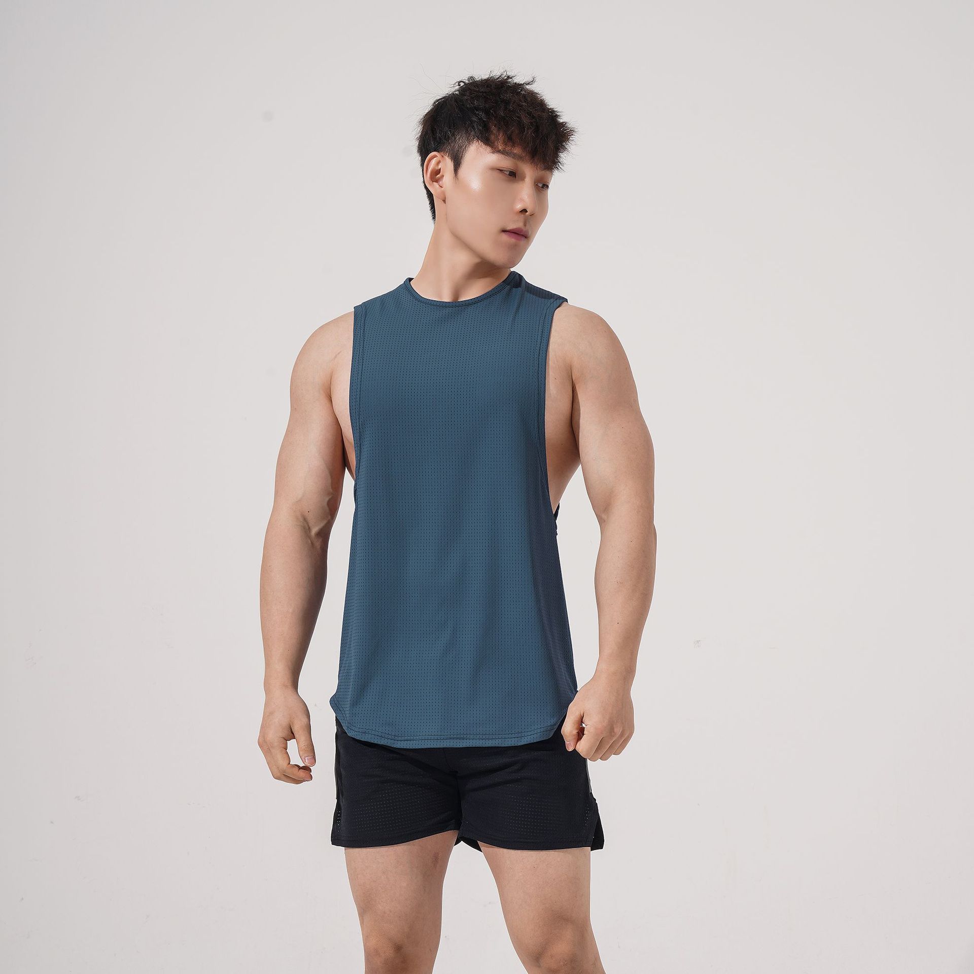 Chaleco transfronterizo de Europa y América malla de material de nylon de los hombres deportes gimnasio chaleco cuello redondo sin mangas en stock suministro