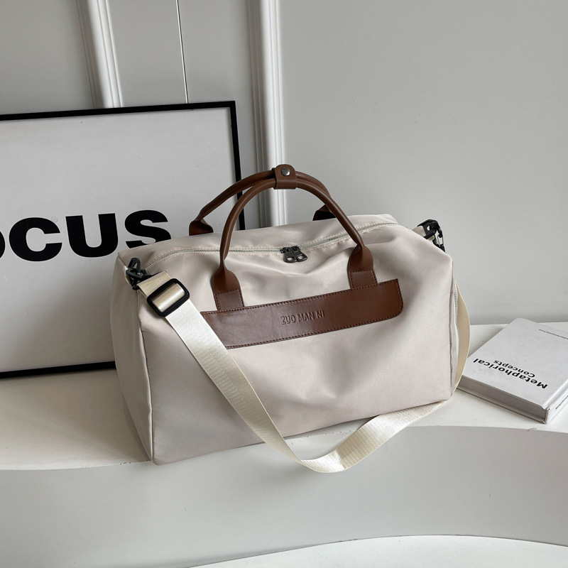 Nueva bolsa de viaje ligera y simple de gran capacidad portátil bolsa de ropa de cama inclinada bolsa deportiva de ocio para mujeres bolsa de ejercicios para hombres