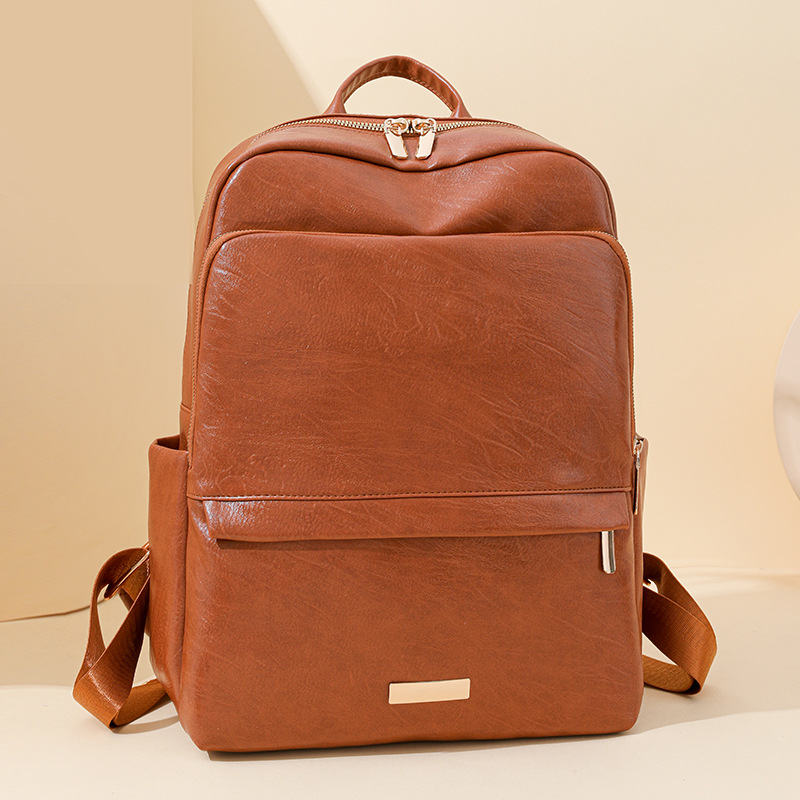 2024 nueva mochila de cuero suave para mujer casual moda retro urbano viaje mochila escolar para estudiantes marea