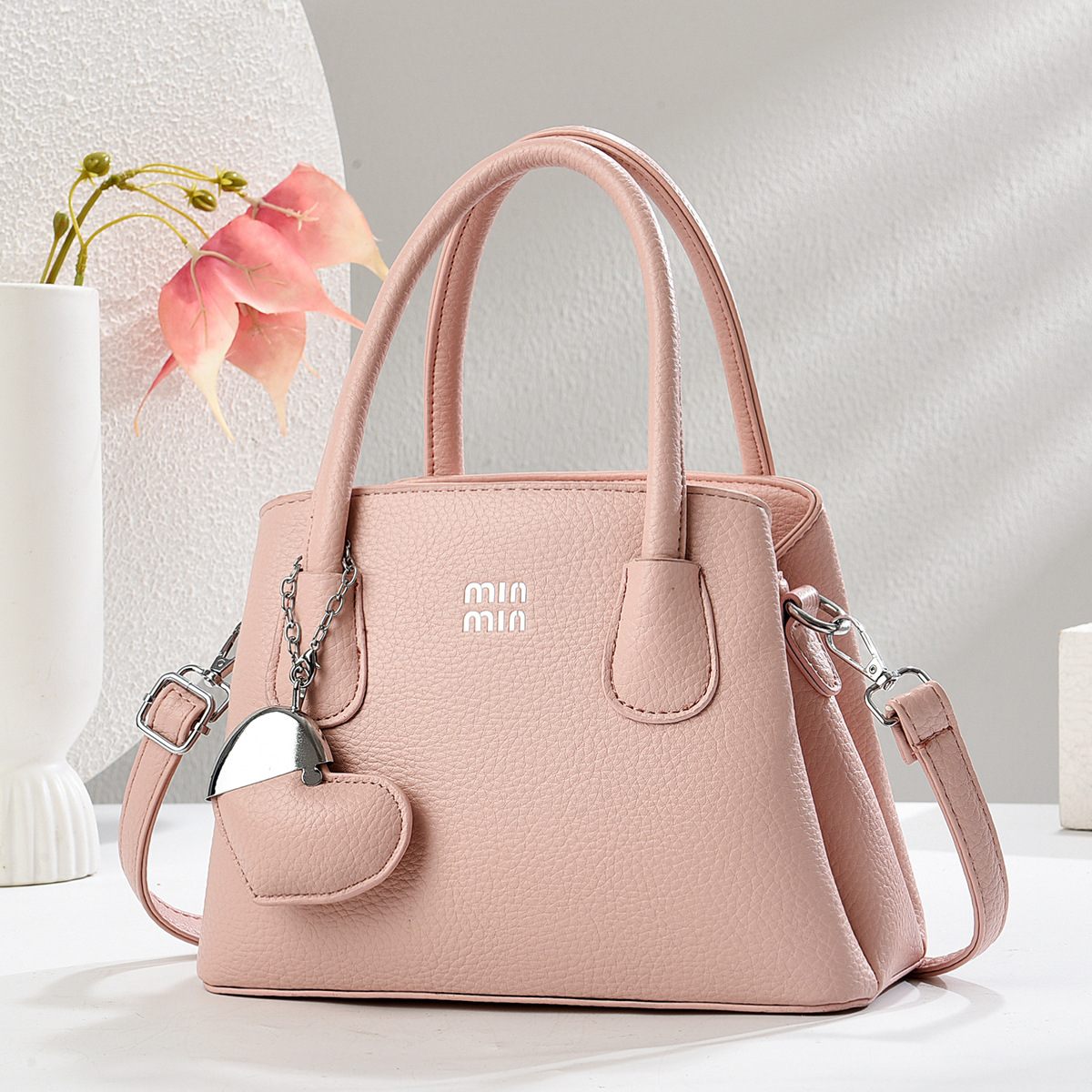 Regalo cálido bolso de mujer bolso de mano mujer 2025 nueva moda atmósfera dama de mediana edad enviar bolso de madre