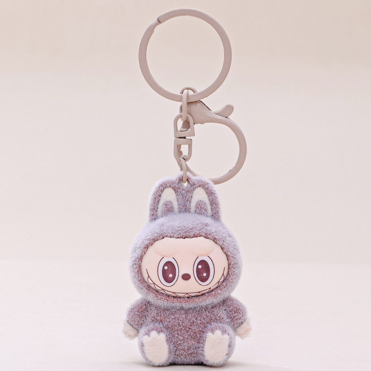 Lindo flocado animal pequeño llavero tirando muñeca de dibujos animados decoración de escritorio bolsa de tela trasera colgante regalo de oficina creativa