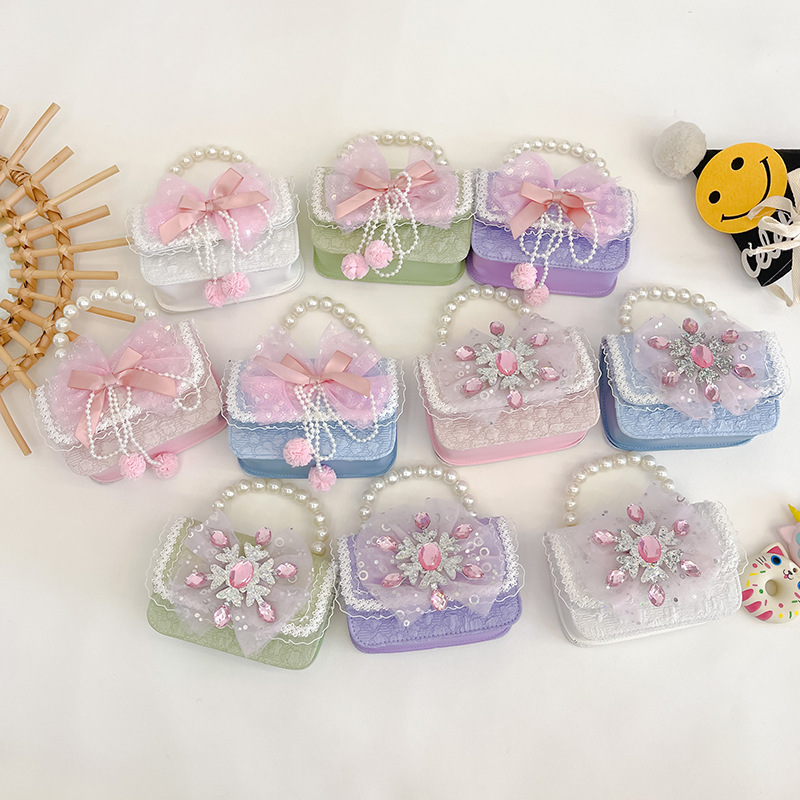 Nuevo arco niñas bolsa mensajero bolsa niños princesa Chanel estilo hombro bolsa bebé fuera moneda monedero bolsa