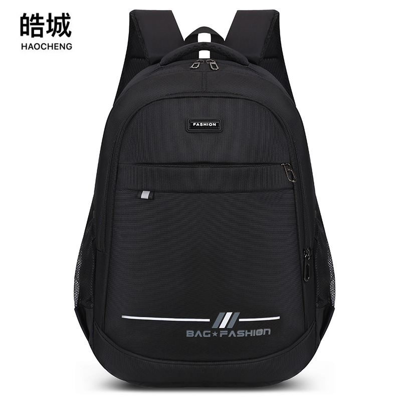 Venta directa de fábrica tendencia de moda mochila casual para hombres salvaje simple viaje al aire libre estudiante de secundaria mochila para computadora